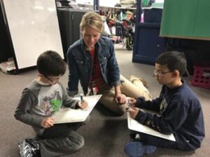 Laura Hilger learned about the Kenowa Hills School District in in 127 steps, when she visited classrooms to learn more about their systems level change.