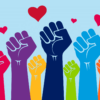 empowered fists of varying skin tones in the air with hearts in the air symbolizing love